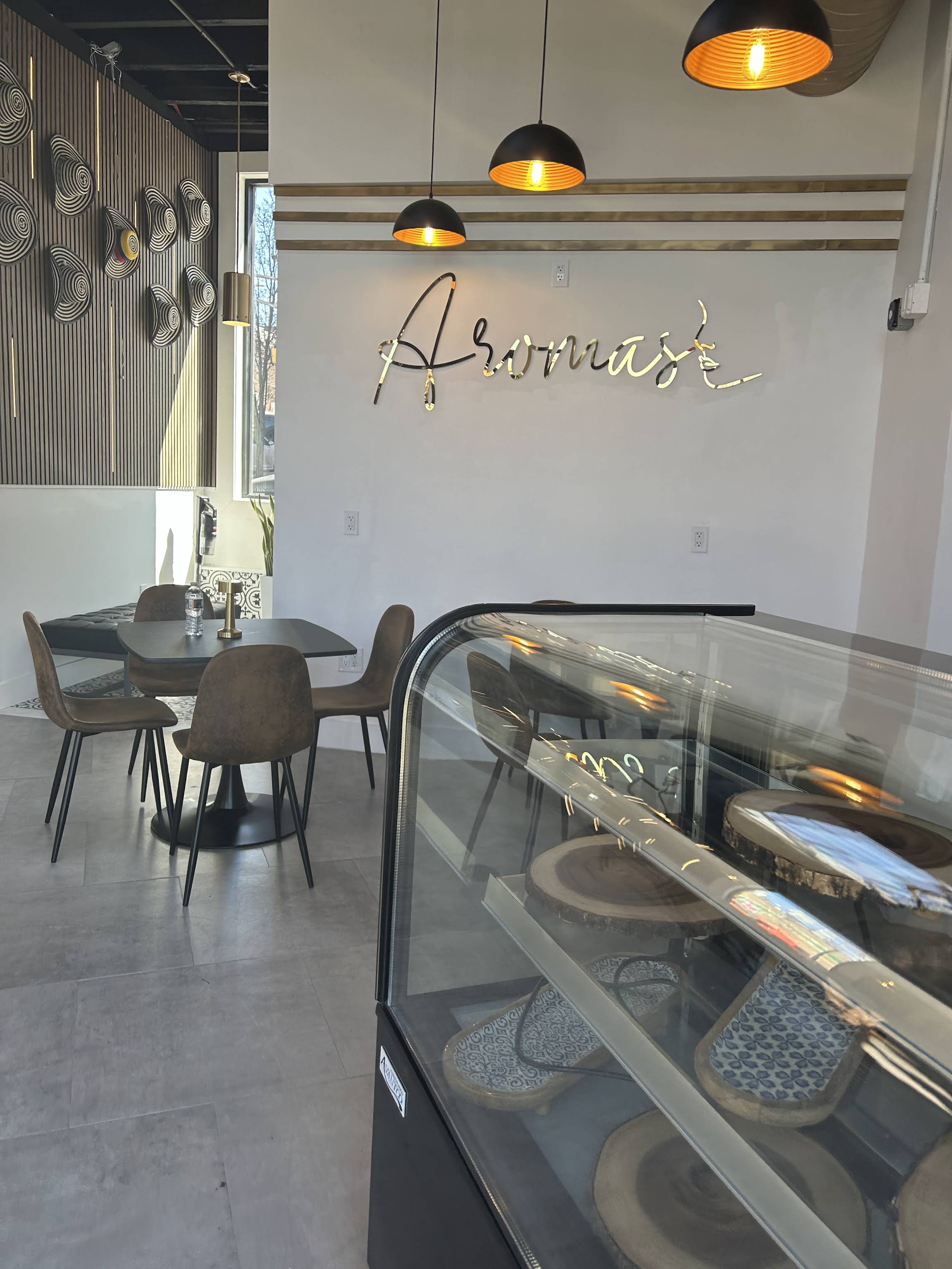 Pared con el logo de Aromas — Union City, NJ